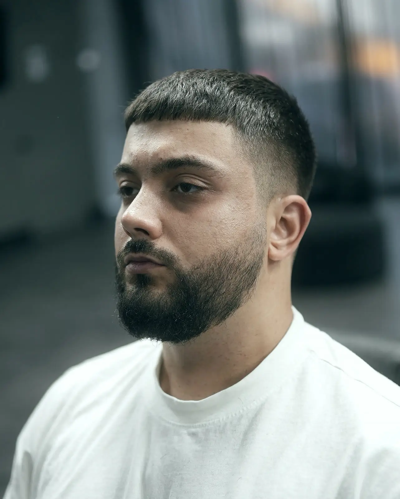 Crop with mid fade and beard shape at ONYX barbershop in Hallandale Beach, FL