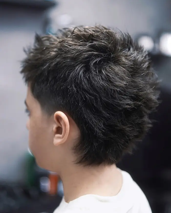 Back view of a tapered textured crop on thick hair at ONYX barbershop in Hallandale Beach, FL