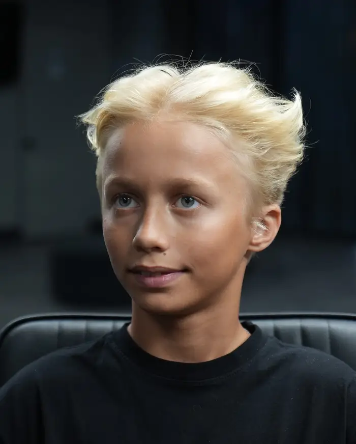 Kids haircut with a textured quiff swept back at ONYX barbershop in Hallandale Beach, FL