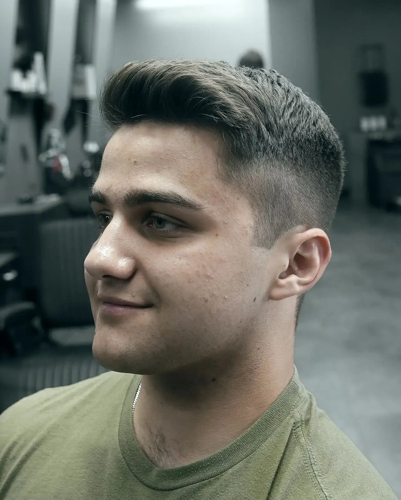 Mid fade haircut with pompadour at ONYX barbershop in Hallandale Beach, FL