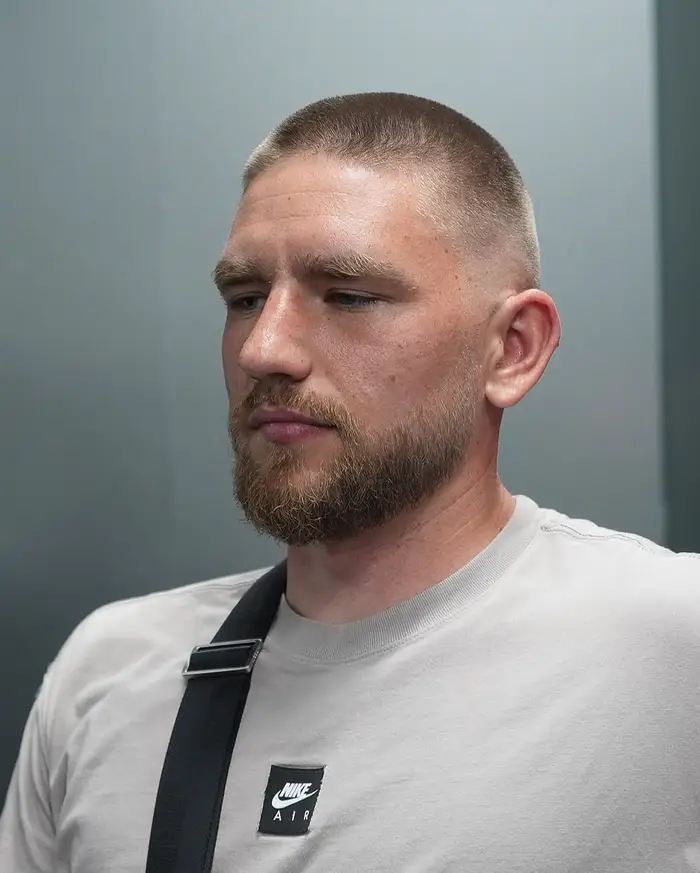 Short crop with a taper and a full beard on fair hair at ONYX barbershop in Hallandale Beach, FL