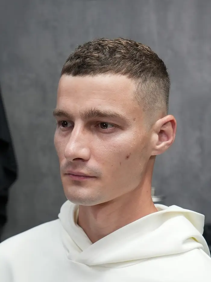 Skin fade on a buzz-length crop with a sharp lineup at ONYX barbershop in Hallandale Beach, FL