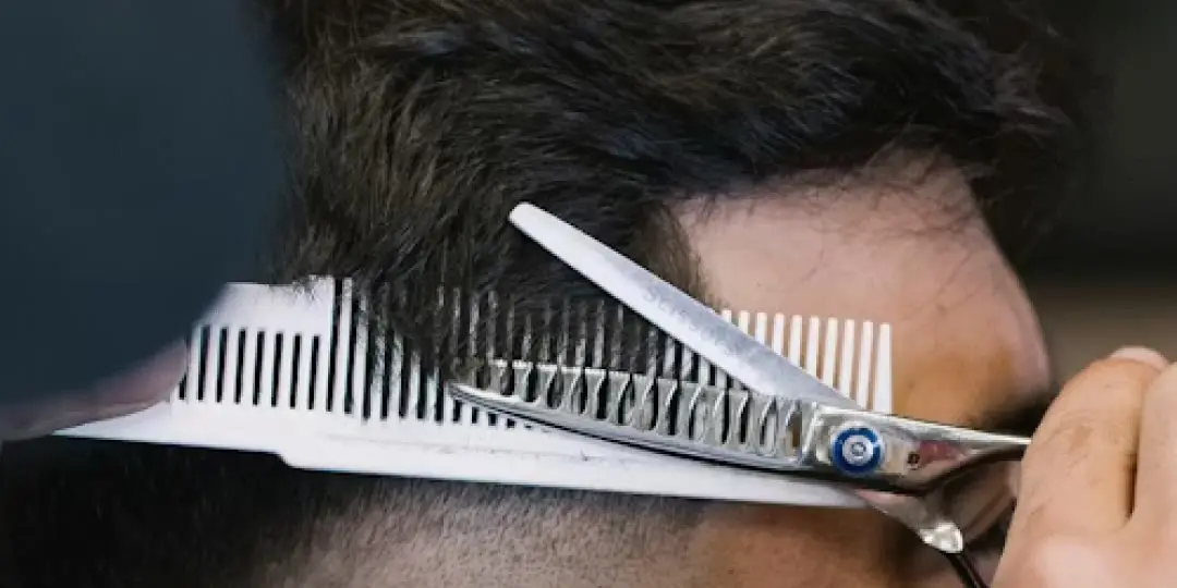 Scissor-over-comb detail work at ONYX barbershop in Hallandale Beach, FL